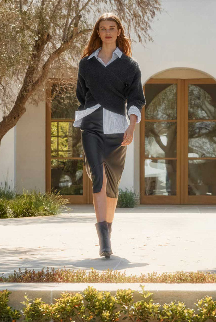 model dressed in brochu clothing walking towards the camera