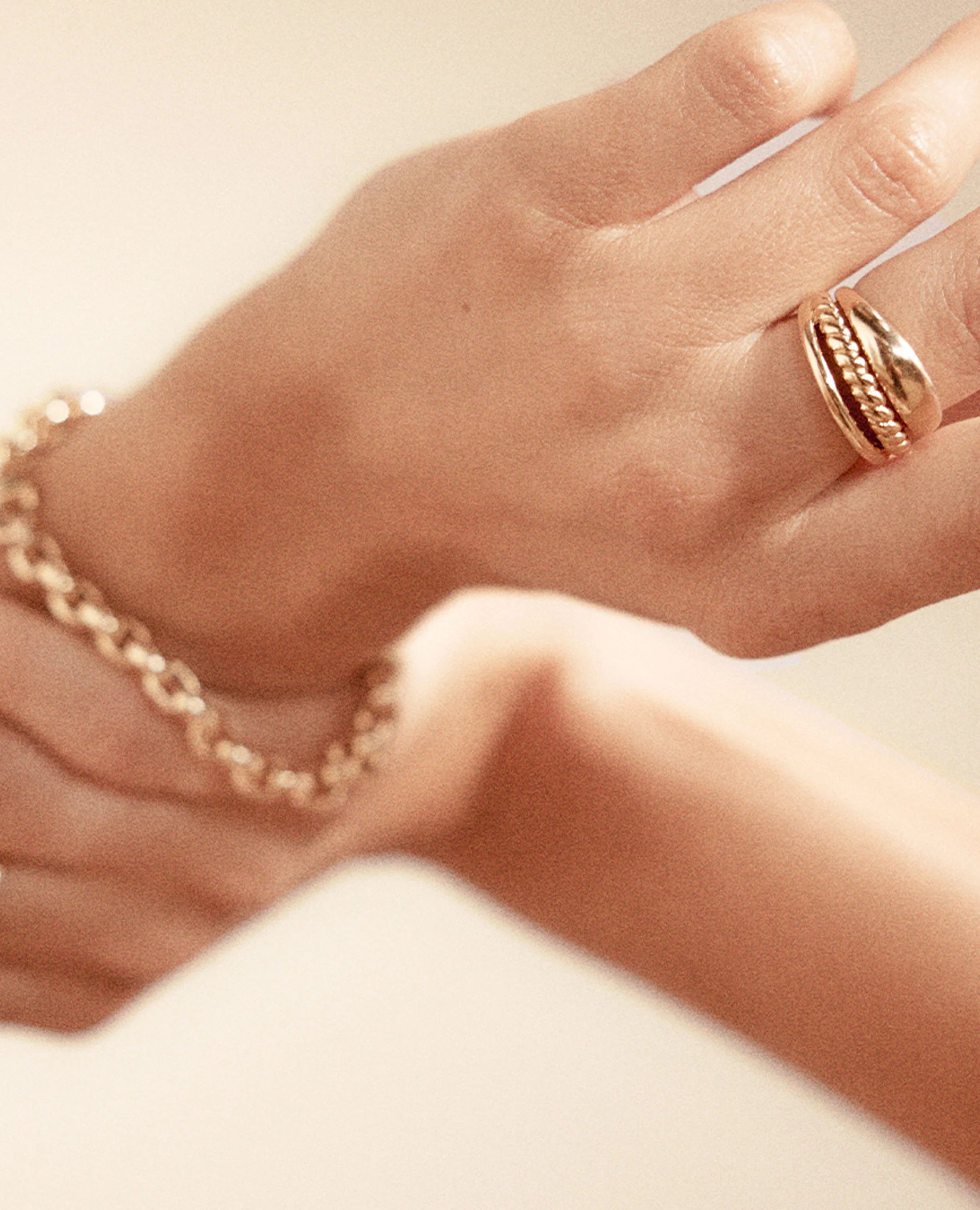 model's hand wearing a bracelet and a ring from brochu walker